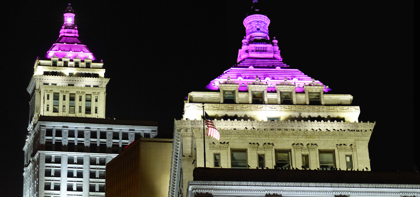 Photo of the tower at 314 Main St in Peoria. Light color is purple.