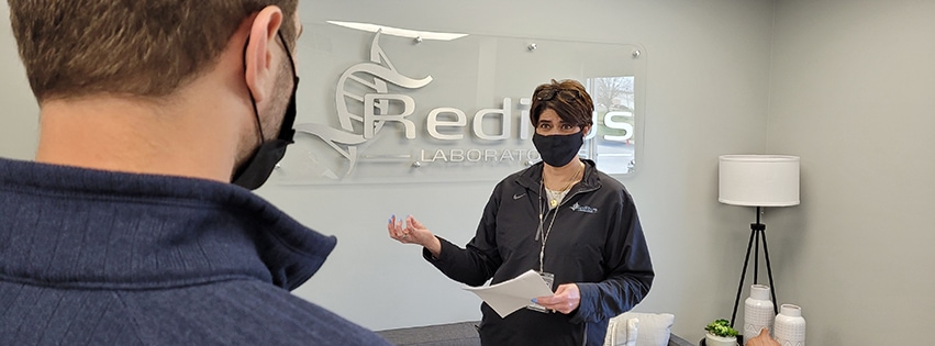 Halley conducting a meeting at Reditus on March 26, 2021. Photo by Jerrad Maher