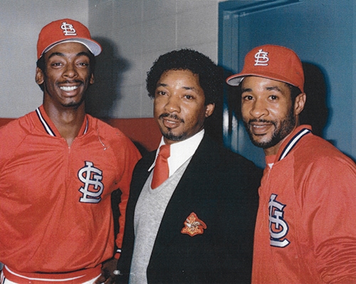 Junior Watkins with St. Louis Cardinals all-stars Willie McGee and Ozzie Smith. Through his public relations work at Brewers Distributing, Junior cultivated strong ties with Anheuser-Busch and the Cardinals organization.