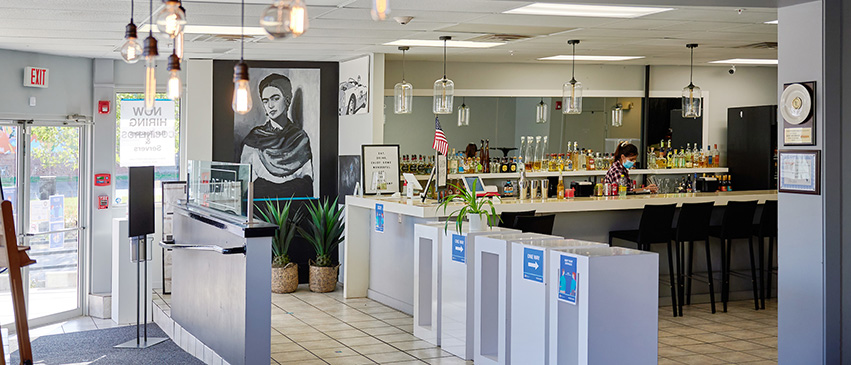 Arturo's striking portrait of artist Frida Kahlo greets customers near the register.
