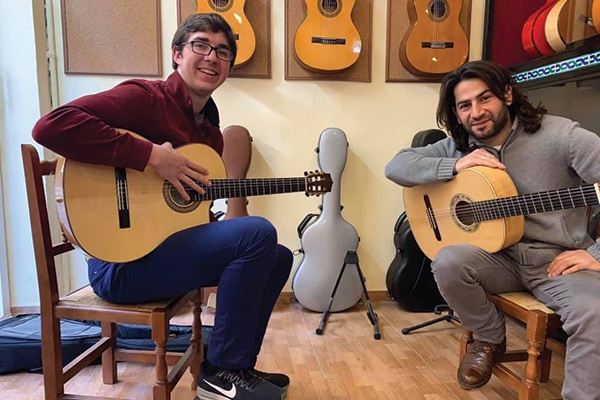 Michael Kuzma has been playing the guitar since he was a kid. While studying abroad in Spain in 2019, he pursued his growing interest in flamenco guitar.