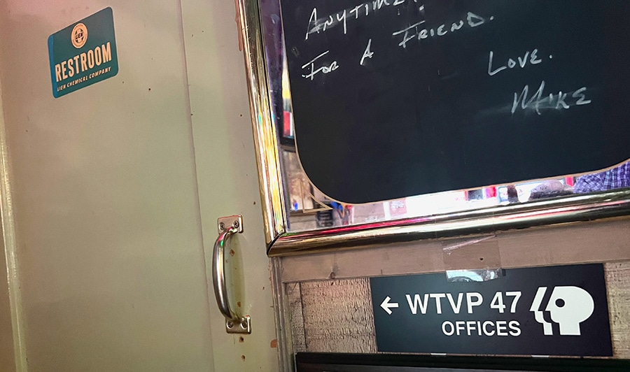 WTVP Offices sign on a wall in a bar