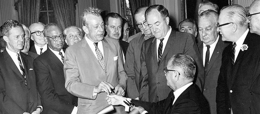 At the signing ceremony for the Civil Rights Act of 1964