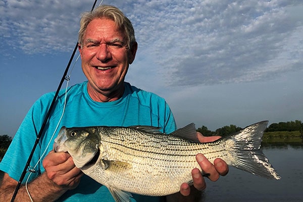 Kim Blickenstaff holding a fish