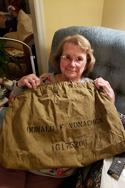 Patricia Vonachen with her late husband’s military duffel bag, December 18, 2019