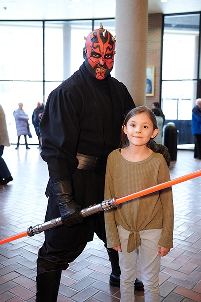 A cosplayer dressed up as Darth Maul from Star Wars