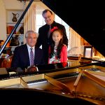 Carnegie Hall performer, Harmony Zhu, with Dr. Soderstrom and Maestro George Stelluto, plays on the castle Steinway before VIP patrons of the Peoria Symphony Orchestra. 