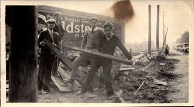 Men clearing flood debris