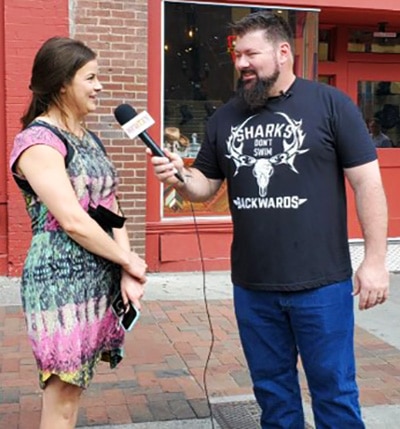 Rob Sharkey man on the street interview with a young woman