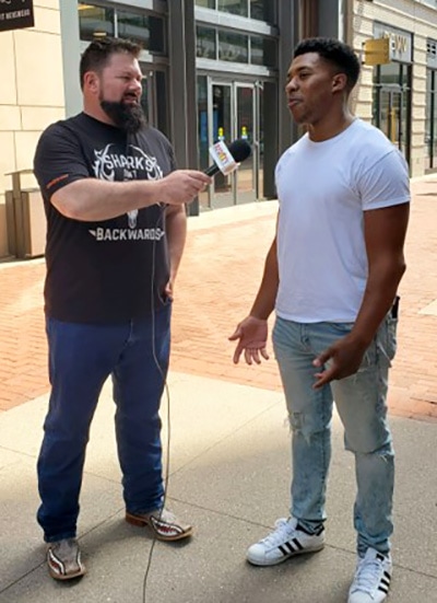 Rob Sharkey man on the street interview with a young man