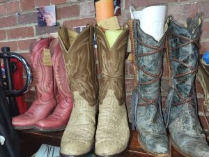 Several pairs of colorful boots