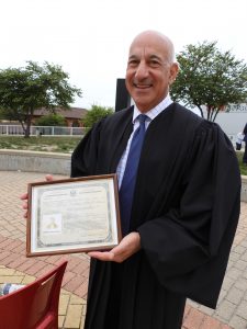 Judge James Shadid holds his grandfather's Certificate of Citizenship