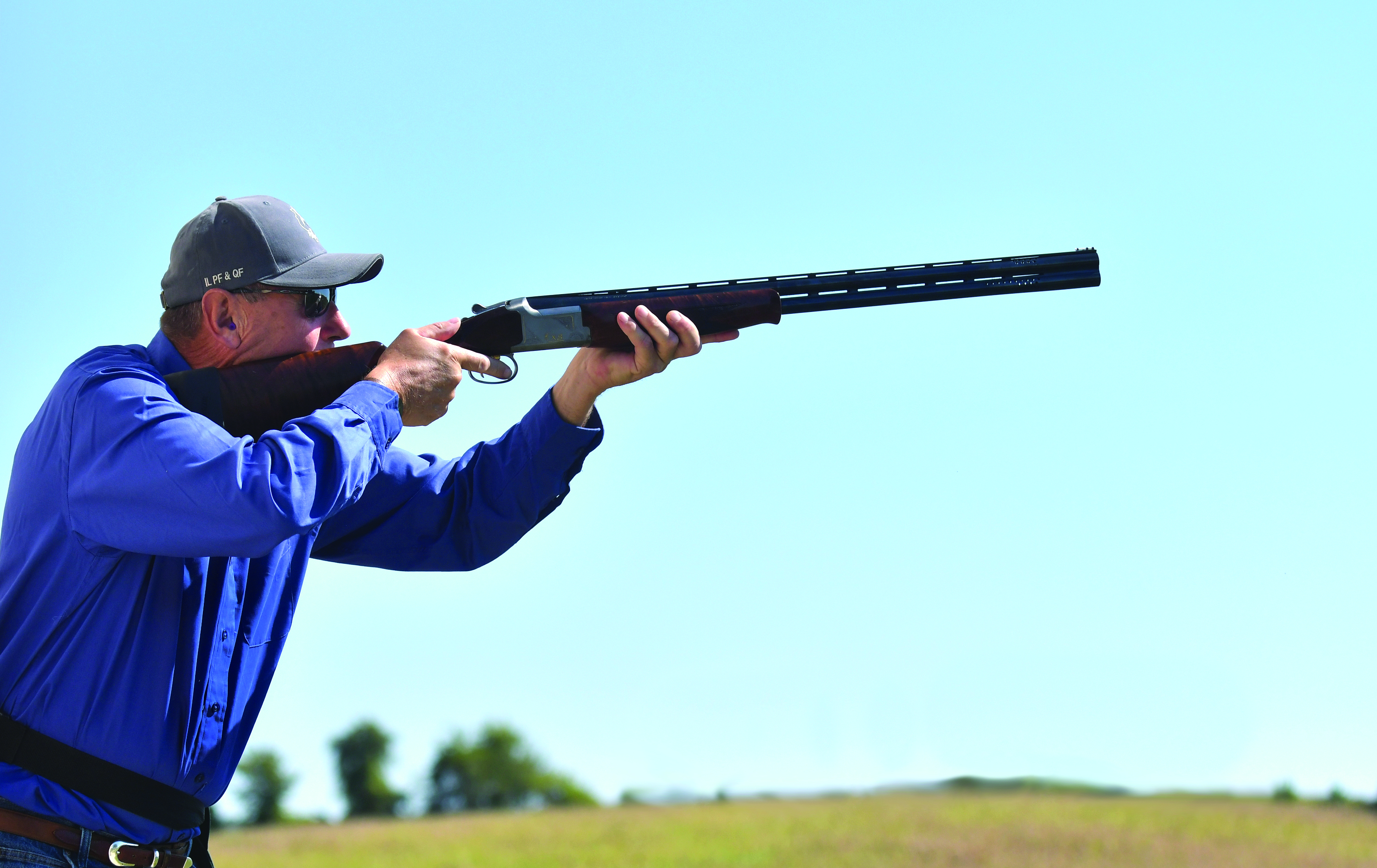 Nick Ripley takes aim during competition on the range at the Peoria Trap and Skeet Club.