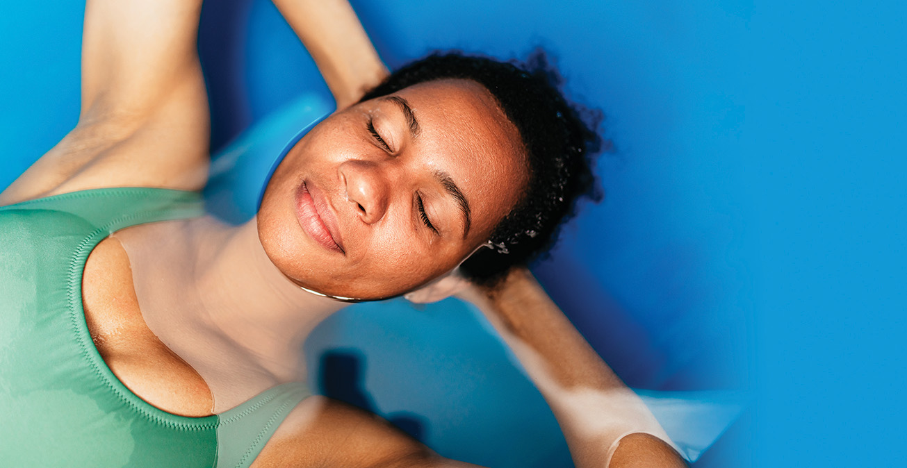 Woman floating in water