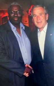 Larry Ivory with former President George W. Bush