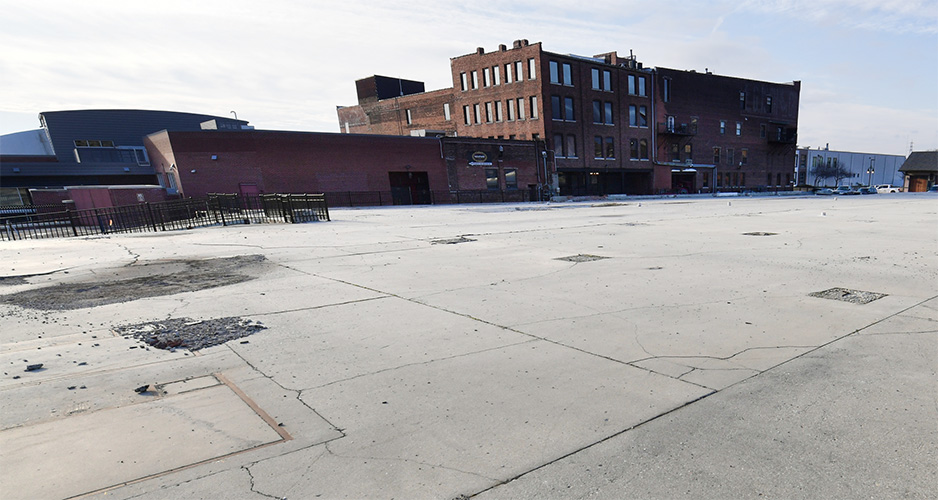 An empty lot awaiting development at State Street and SW Washington