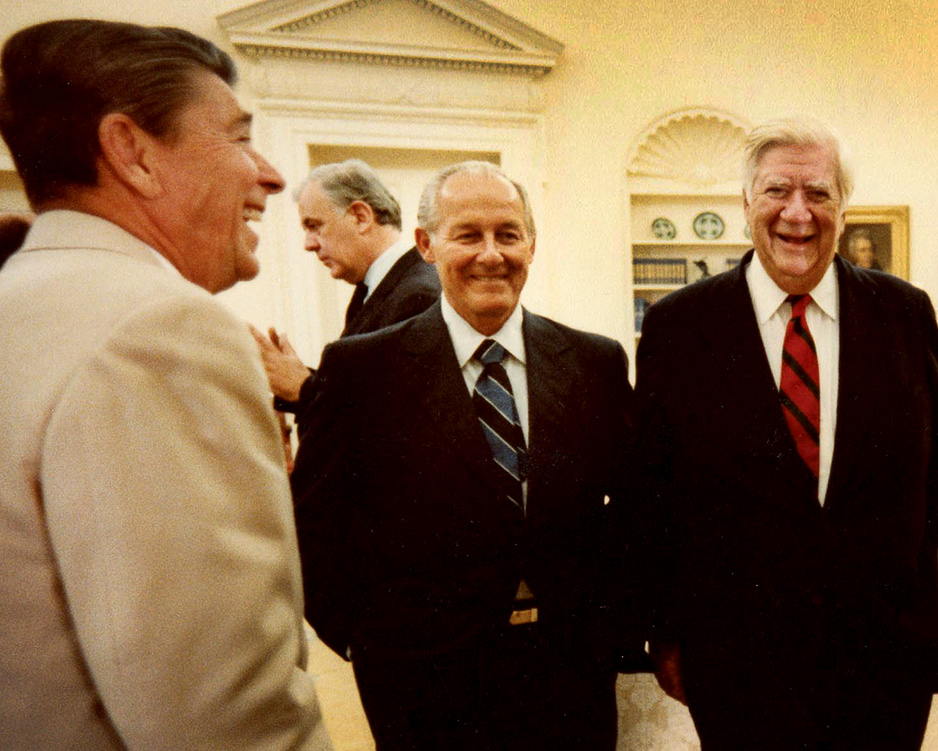 Minority Leader Bob Michel enjoys a laugh alongside President Ronald Reagan and House Speaker Tip O'Neill in this August 1982 photo.
