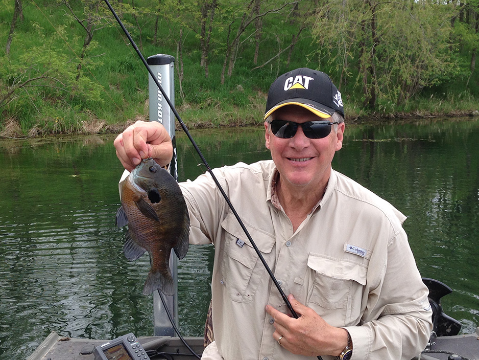 Former Caterpillar CEO Doug Oberhelman lands a big bluegill