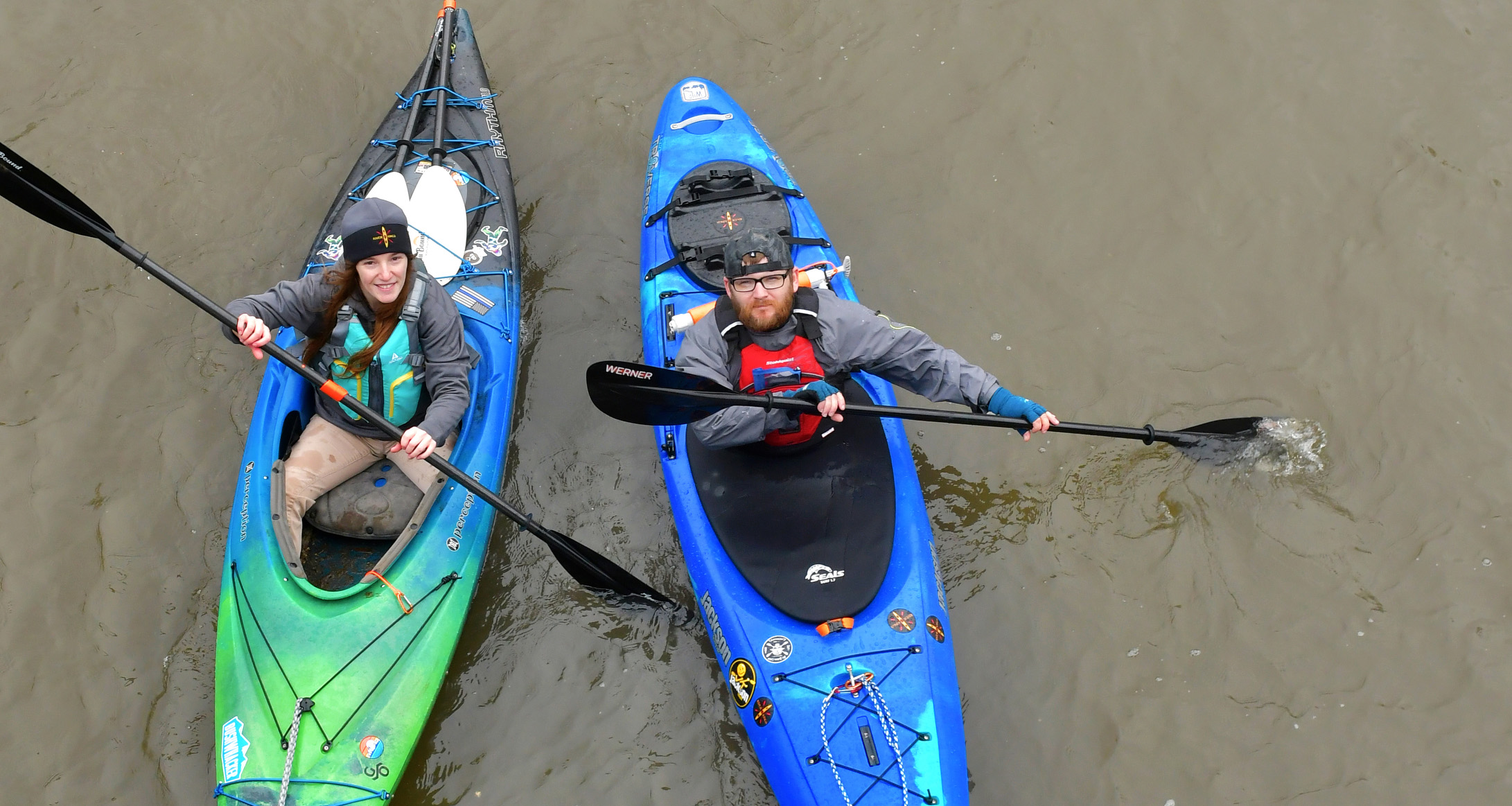 Andrew Thompson and Kelsey Moss kayak the Mackinaw River