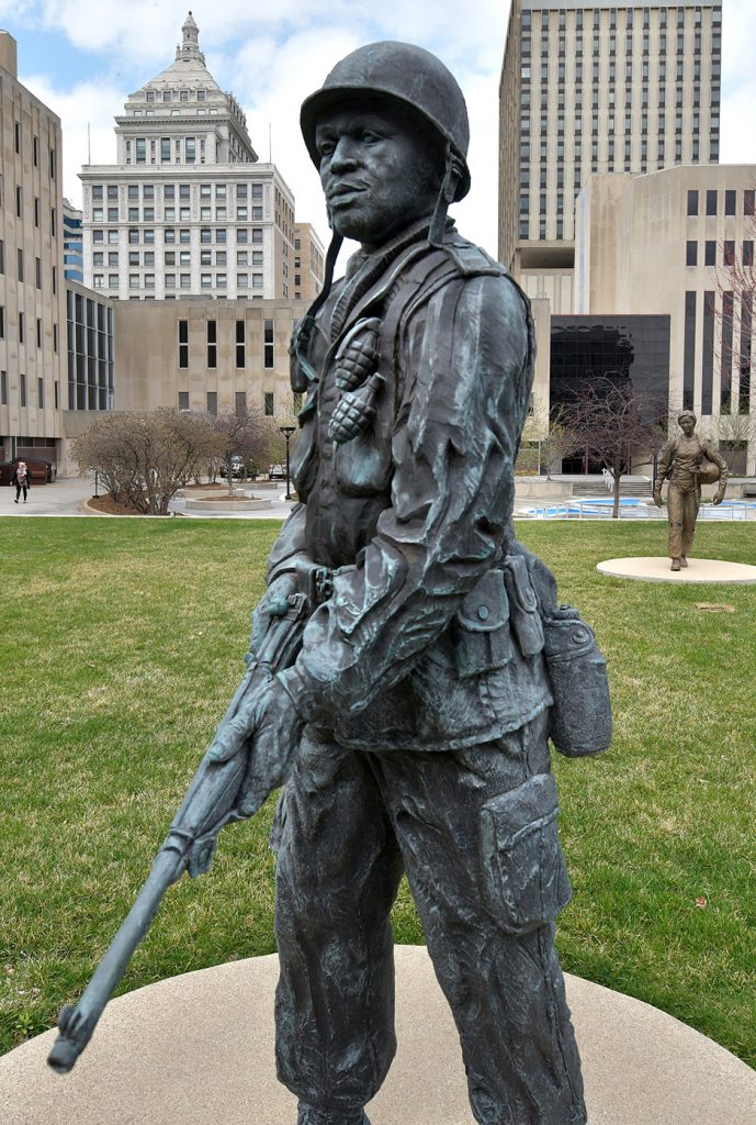 The bronze statue of a Korean War soldier was sculpted by Preston Jackson