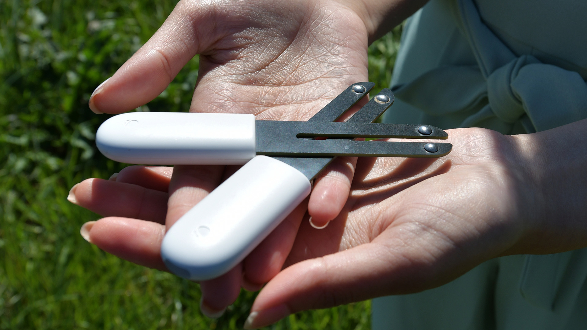 Khushi Shah shows the sensors that go with her irrigation invention