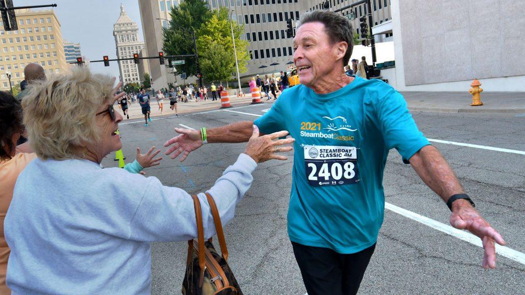 William Feuchter welcomes the support as he heads to the finish line in the 4-mile race of the Steamboat Classic