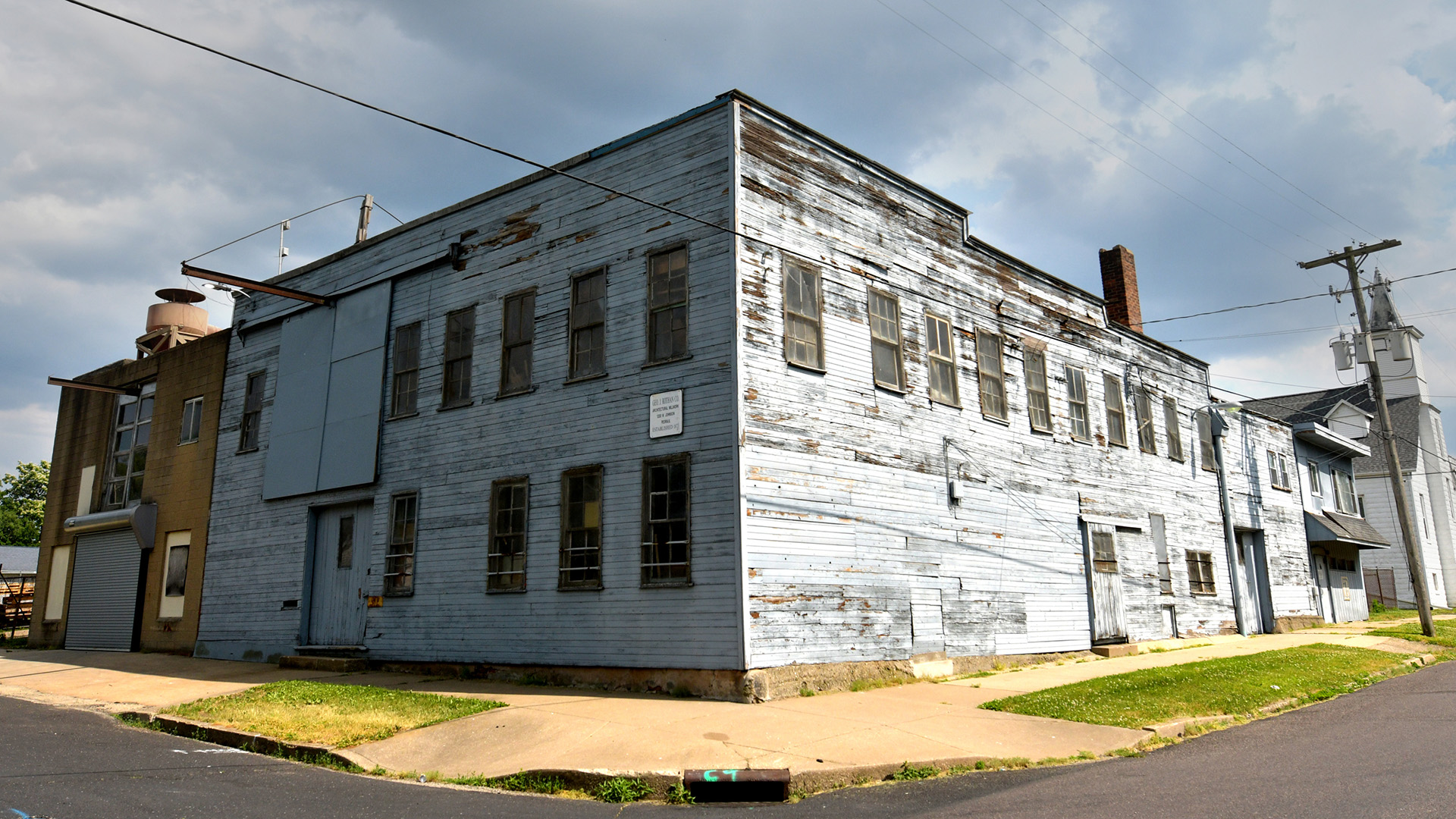 The George J. Rothan Company building at 619 W. Johnson St., Peoria. Below, the company's early days at the same location