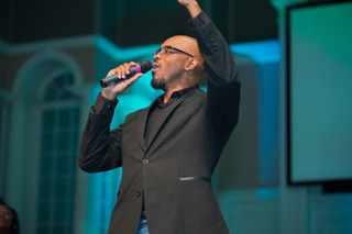 Deveraux Hubbard sings at a release party for his CD, “A Worshipper’s Lament.” The album chronicled his struggle with grief after the 2013 death of son Deveraux Hubbard II 