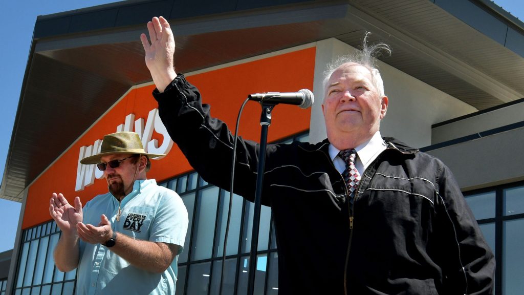 Pontiac Mayor Bill Alvey speaks to the crowd at Wally's superstore off Interstate 55 on National Road Trip Day, May 26