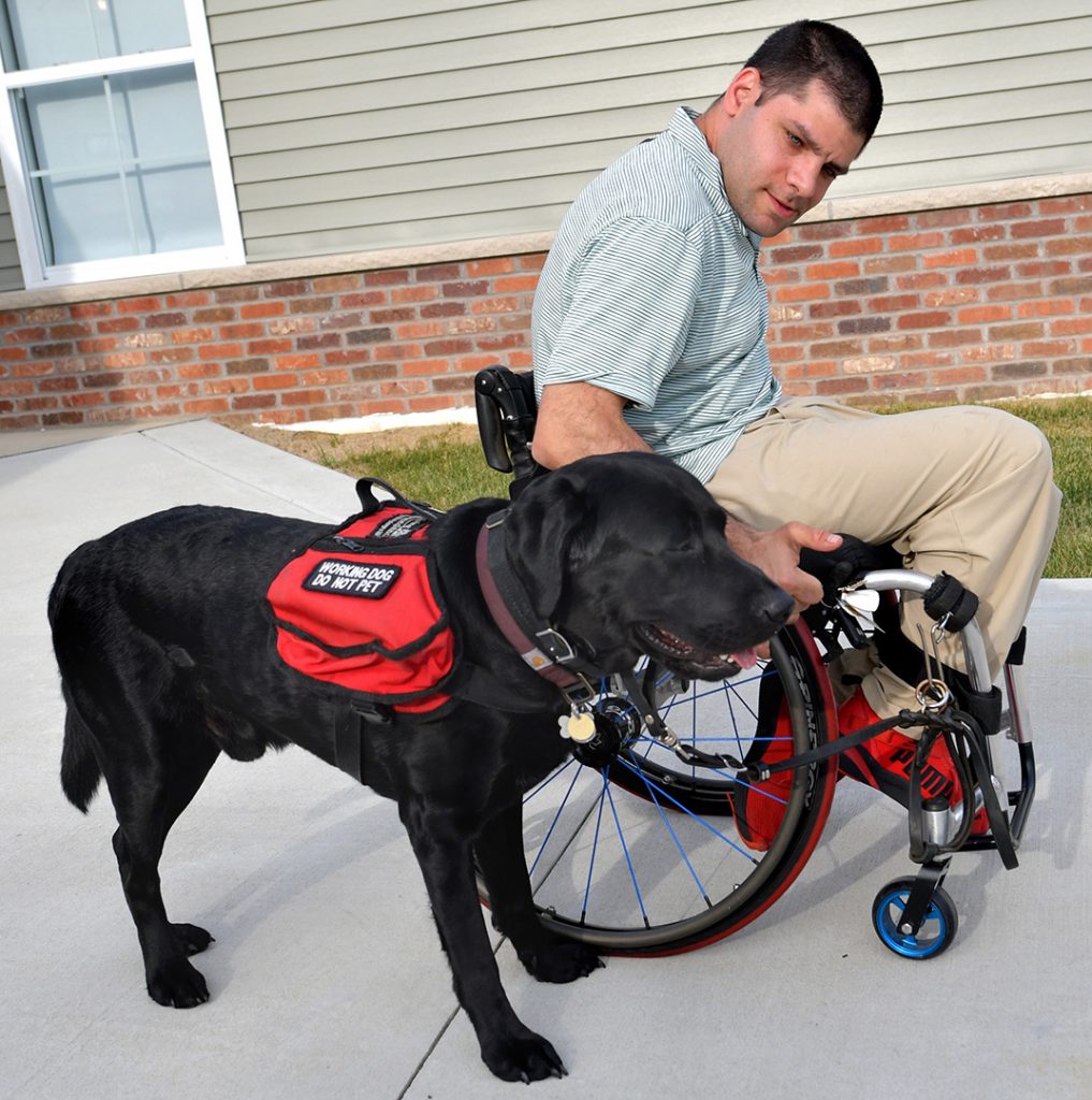 Steve Kouri and his service dog Bard from Paws Giving Independence