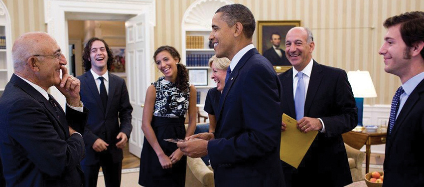In 2011, during the U.S. Senate process of confirming James Shadid as a federal judge, he and his family meet in the Oval Office with President Barack Obama. From left to right are Shadid’s father George, son Joe, daughter Maggie, wife Jane, President Obama, Shadid, and son Jim