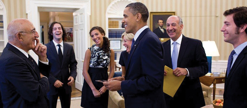 In 2011, during the U.S. Senate process of confirming James Shadid as a federal judge, he and his family meet in the Oval Office with President Barack Obama. From left to right are Shadid’s father George, son Joe, daughter Maggie, wife Jane, President Obama, Shadid, and son Jim