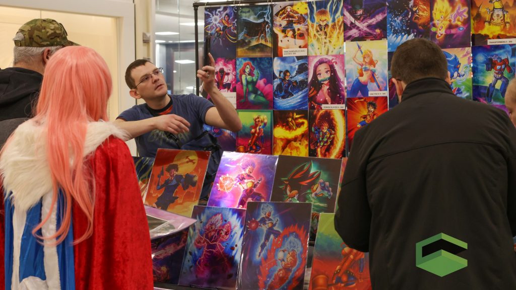 A vendor makes a sales pitch at QuadCon