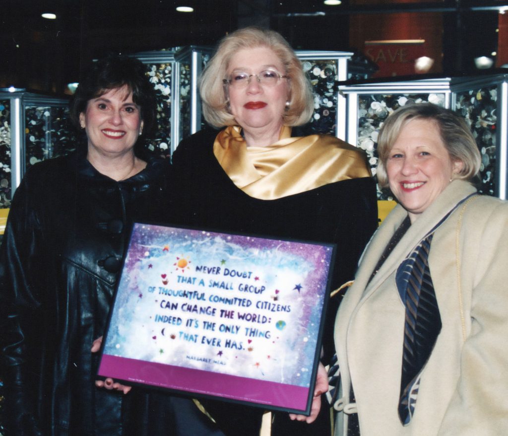 Susan Katz, executive director of the Jewish Federation of Peoria, and Peoria Holocaust Memorial committee members Evelyn Vogel and Dr. Joy Miller at the April 2003 dedication of the memorial at the Shoppes at Grand Prairie