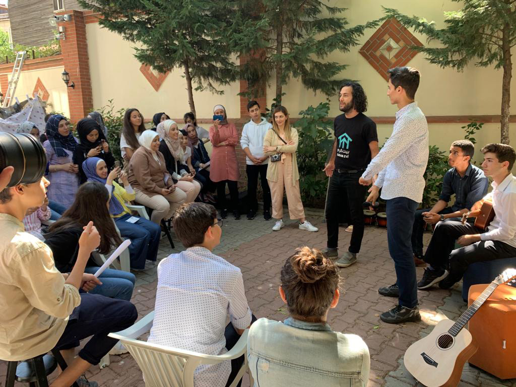 In 2019, Joe Shadid (black t-shirt) taught music to children in Turkey. He went there as a volunteer with the Karam Foundation, which aids Syrian refugees