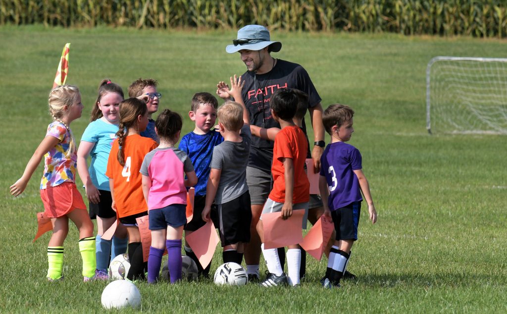 Joe Monaghan of The Christian Center coaches young athletes in the soccer program