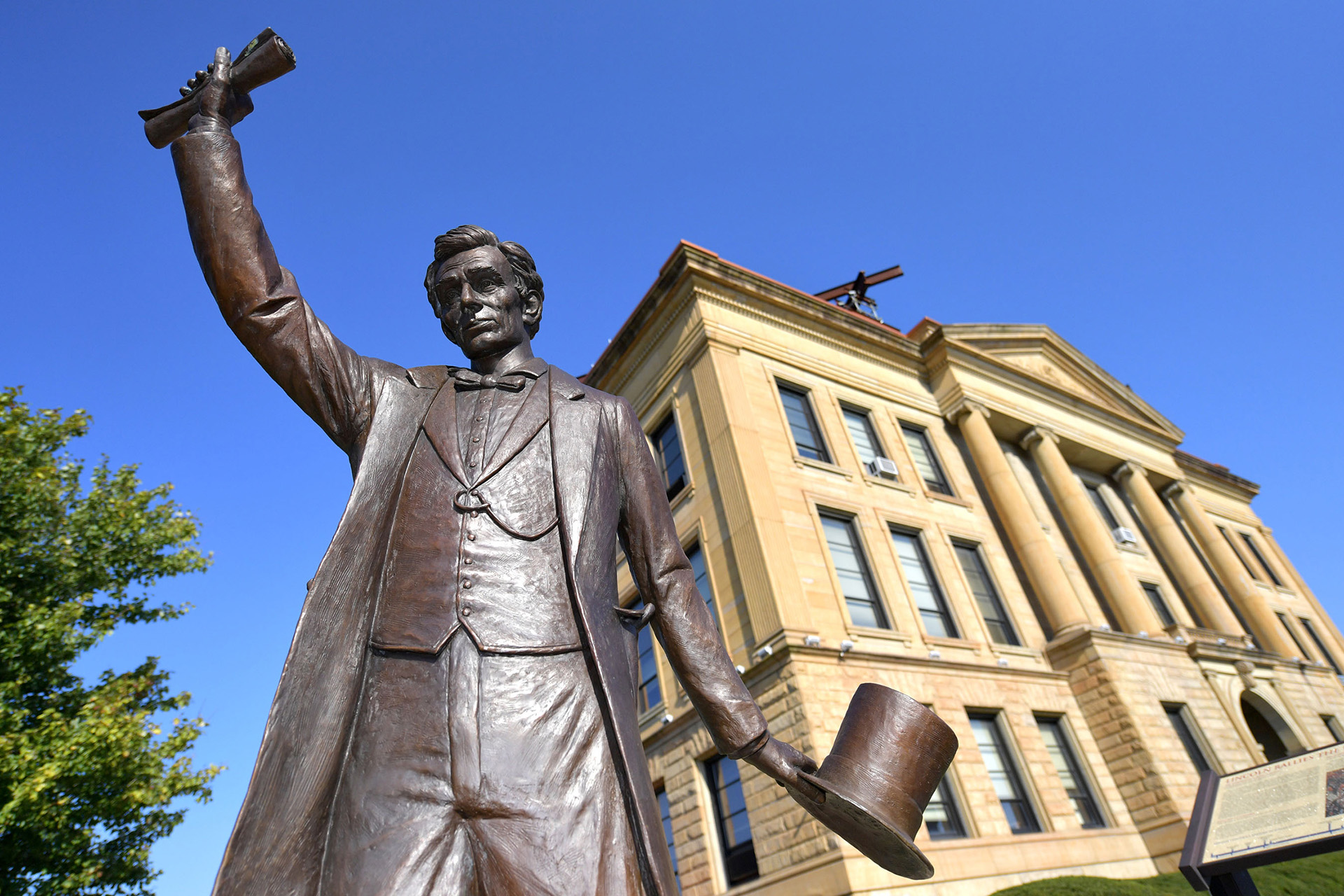 Lincoln statues stand in several places in the town of Lincoln, this one outside the Logan County Courthouse