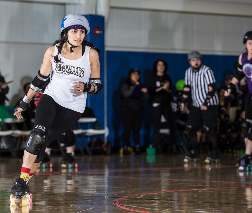 Abi-Akar participates in the Peoria Prowlers roller derby competition.